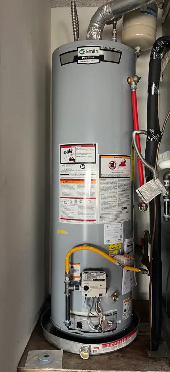 A tank water heater installed by Osage