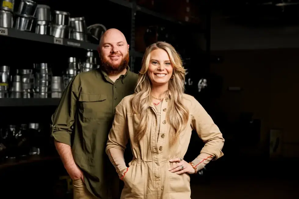 Lacee and Jake, the owners of Osage Air, in their Springdale parts room